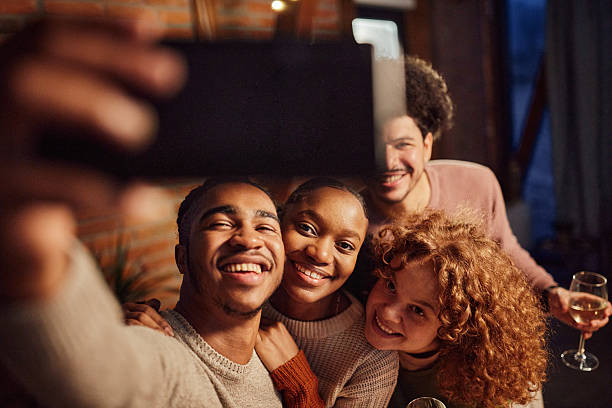 istock Happy couples taking a selfie with cell phone at home. 2226415225