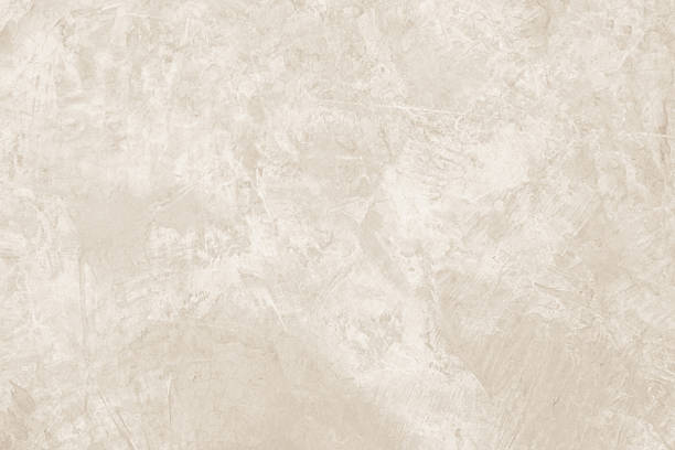 istock Colour old concrete wall texture background. Close up retro plain cream color cement wall background texture. Design paper vintage parchment element. 2226416523