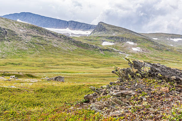 istock Mountain scenery with a rock on a heath 2226417328