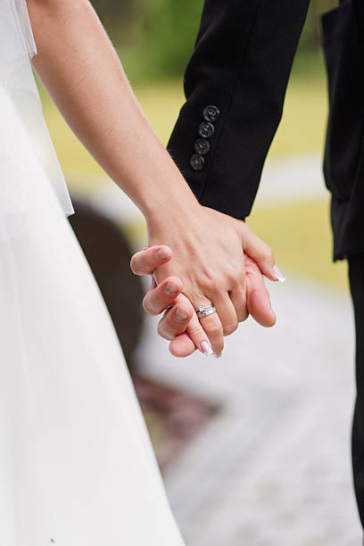 istock Newlyweds holding hands. Wedding ceremony. 2226417348