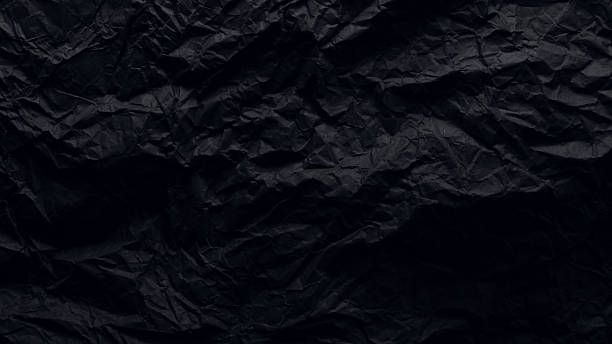 istock black crinkled paper for background 2226419254