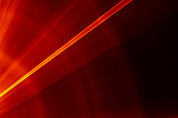 istock laser light. streaks of light rippling and twisting 2226419297