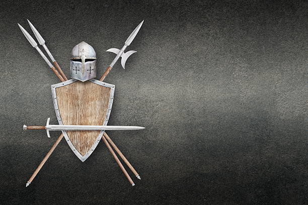 istock knight's sword helmet shield two spears and halberd on grunge background 2226420446