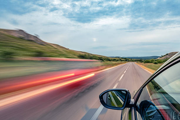 Driving at dawn on a country road