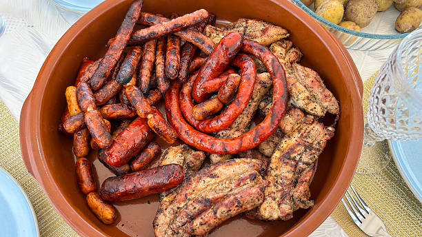 istock Container with sausages and barbecue meat 2226424469