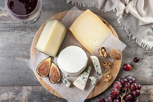 istock Charcuterie Board with Cheese, Grapes, and Figs 2226427138