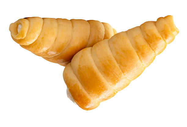 istock Side view of two puff pastry cream horns in stack isolated on white background with clipping path 2226428454
