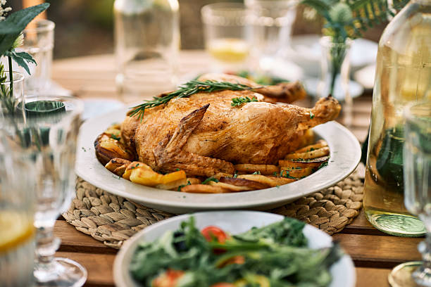 istock Rustic Outdoor Lunch with Whole Roasted Chicken 2226428886
