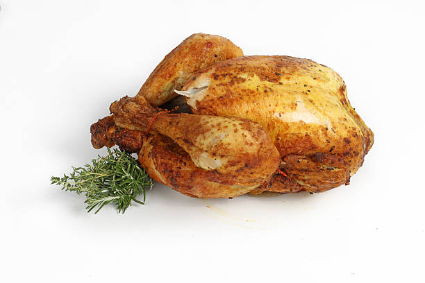 istock Roasted cooked chicken on a white background 2226429629