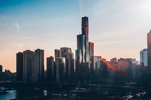 istock Urban skyline at sunset with modern skyscrapers. 2226431202