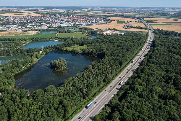 istock Highway, forests and lakes from above 2226432710