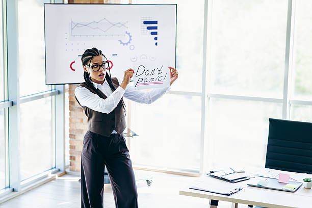 istock Confident businesswoman delivering a dynamic presentation while showcasing strategic insights in a modern corporate office 2226433635