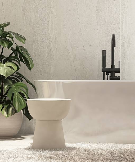 istock Minimal marble side table by white, cream freestanding bathtub in modern, elegant bathroom, sunlight on stone tiled wall with tropical monstera tree for luxury fashion, beauty, cosmetic, skincare, body care product display background 3D 2226437074