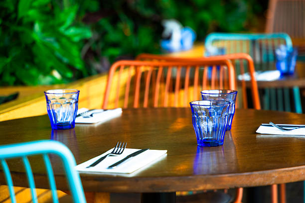 istock Restaurant tables and colorful chairs 2226439978