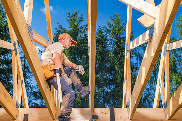 istock Skilled Carpenter Working on Roof Framework in a Residential Construction Site 2226440479