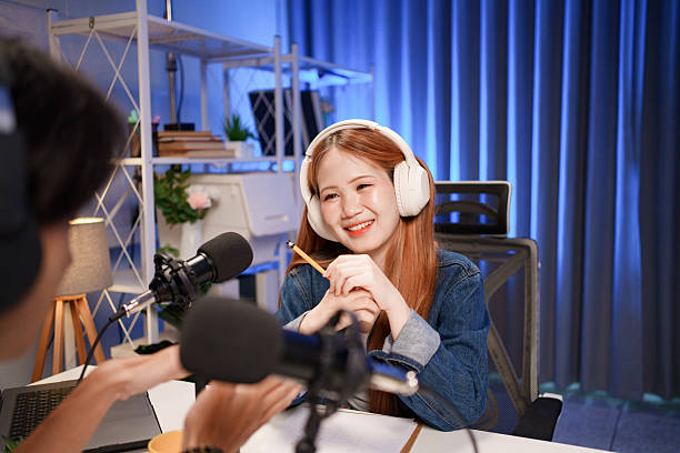 istock People in the podcast studio talking and recording 2226457362