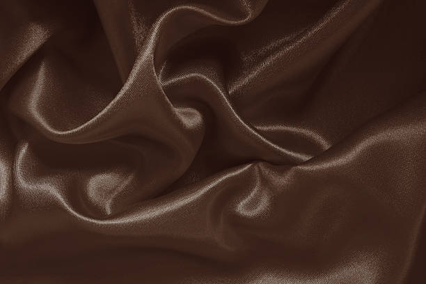istock Dark brown fabric texture background, detail of silk or linen pattern. 2226460973
