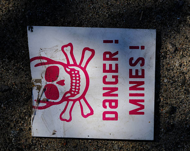 A land mine warning sign in Korean script and English. Paju. Gyeonggi Province. South Korea.