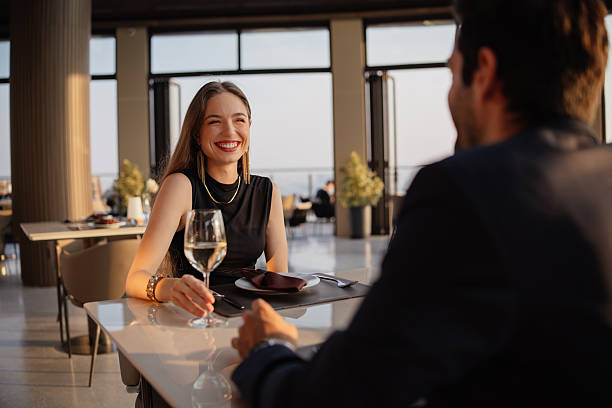 istock Elegant couple enjoying a romantic dinner 2226471829
