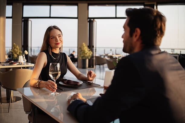 istock Elegant couple enjoying a romantic dinner 2226471878