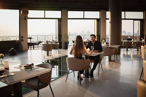 istock Elegant couple enjoying a romantic dinner 2226471913