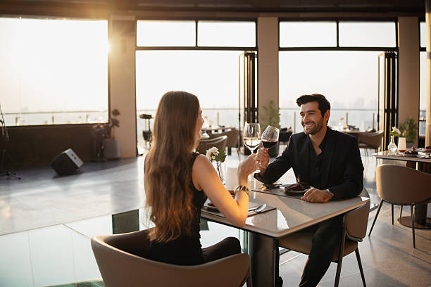 istock Smiling couple having a toast 2226471924