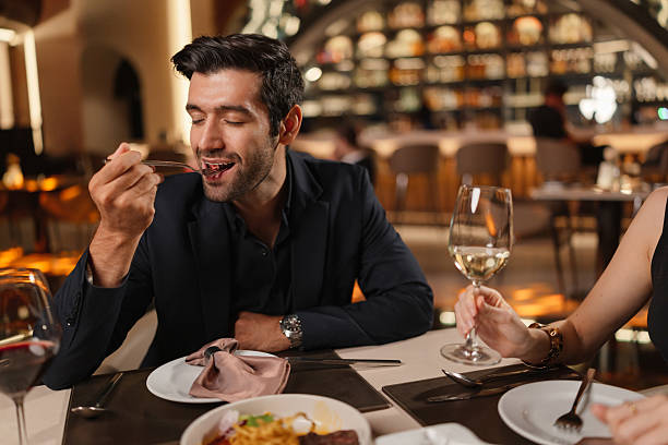 istock Elegant man dining in a luxury restaurant 2226472327