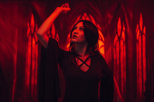 istock Female Vampire In A Castle Under Red Lights 2226473434