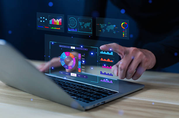 istock Business analysts use computers and dashboards to analyze data and metrics connected to databases for financial technology operations. 2226473514