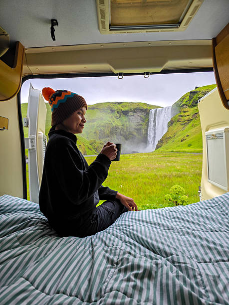istock Enjoying warm coffee while admiring the stunning Skogafoss waterfall in Iceland 2226473919