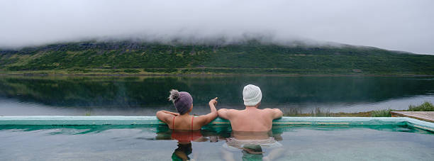 istock Relaxing in the geothermal hot spring overlooking stunning Icelandic landscape 2226473924