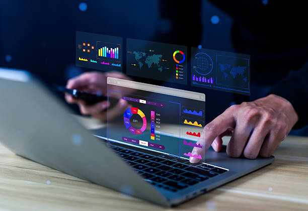 istock Business analysts use computers and dashboards to analyze data and metrics connected to databases for financial technology operations. 2226474249