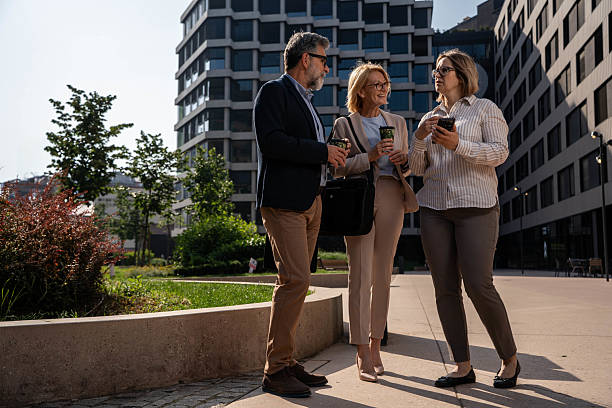 istock Group of managers collaborating on project using digital tablet outdoors 2226474966