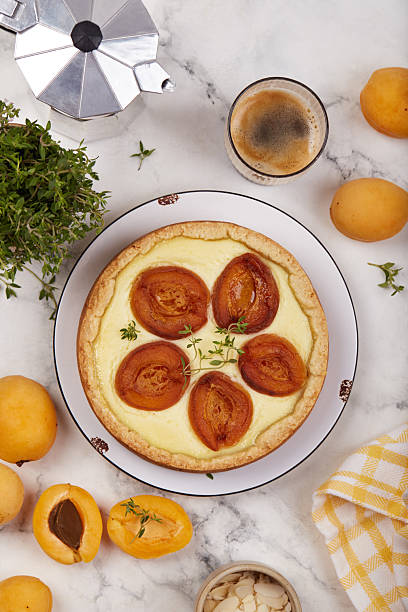 istock Cheesecake pie tart with apricots and thyme. Top view. 2226476372