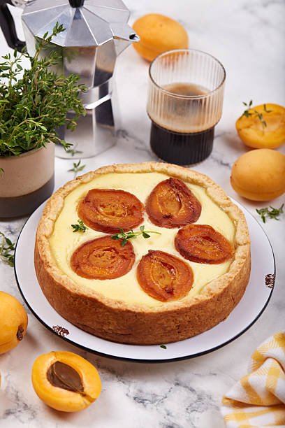 istock Cheesecake pie tart with apricots and thyme. 2226476373