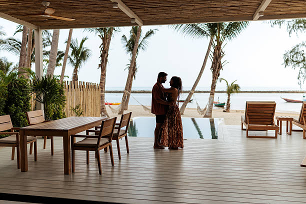 istock Romantic honeymoon couple enjoying tropical paradise 2226478068