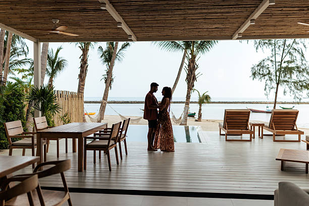 istock Romantic honeymoon couple enjoying tropical paradise 2226478572