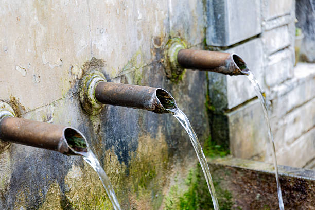 istock Old fountain in a forest 2226480206