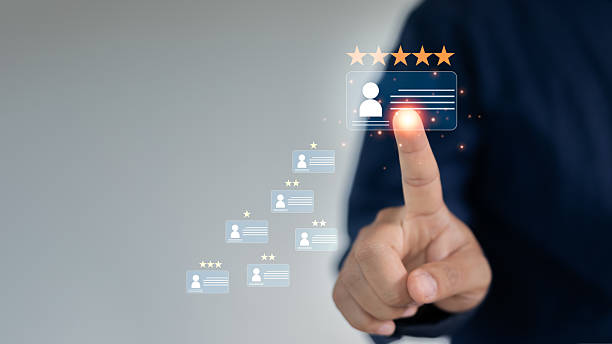 istock Businessman hand touching virtual five-star profile card, representing talent evaluation, recruitment rating, employee selection, and digital HR ranking system. 2226486775