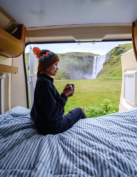 istock Enjoying a warm beverage while camping near Skogafoss waterfall in Icelands stunning landscape 2226494949