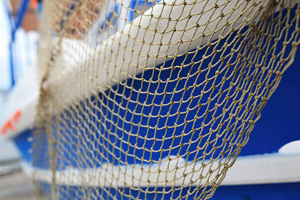 istock Fishnet on a boat side. Koroni. Greece 2226501668
