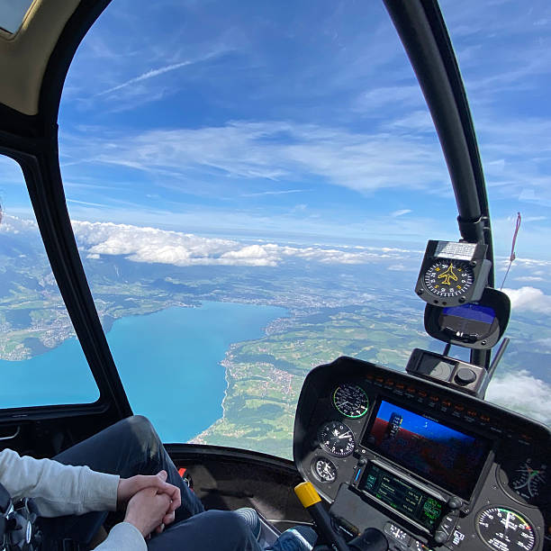 istock Alpine helicopter flies over mountains 2226502009