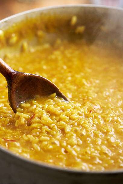 Preparing Saffron Risotto in Domestic Kitchen