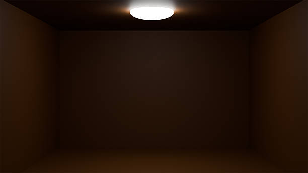 istock Modern ceiling lamp, glowing round light fixture on dark ceiling in empty room with brown walls, minimalist interior 2226506876