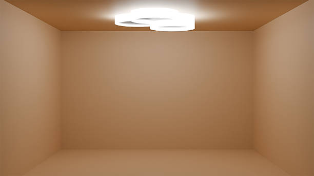 Abstract view of receding pillars and lights hanging from the ceiling in the city.