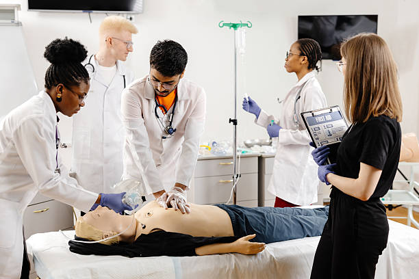istock Doctors practicing cardiopulmonary resuscitation on a medical manikin 2226511155