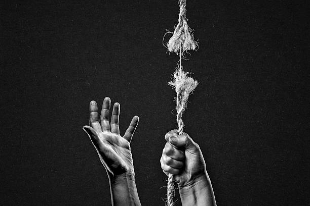 istock Hold on to Frayed Rope About to Break Asking for Help 2226511441