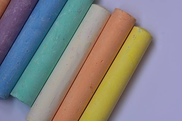 istock Close-up view of pastel-colored chalk sticks arranged in a diagonal pattern. Artistic texture and color variety suitable for education, creativity, or children drawing concepts. 2226516539