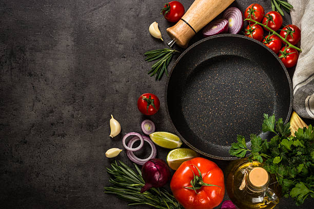 istock Ingredients for cooking at black table. 2226516830