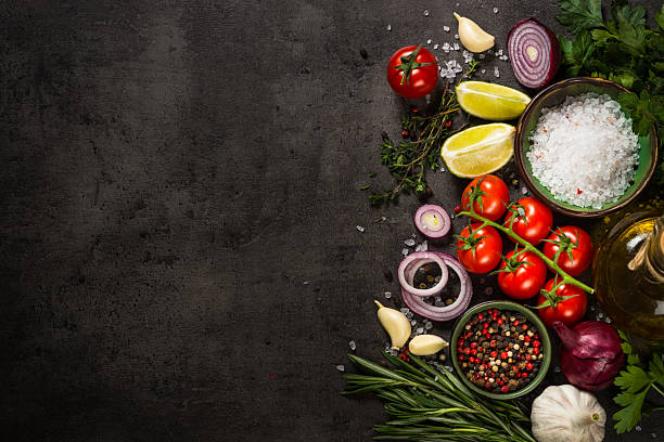 istock Ingredients for cooking at black table. 2226517515
